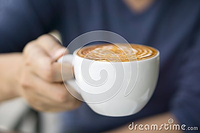 Close-up of male hand holding coffee Stock Photo