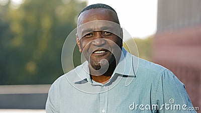 Close up male portrait in city outdoors African American mature senior man ethnic middle-aged adult elderly businessman Stock Photo