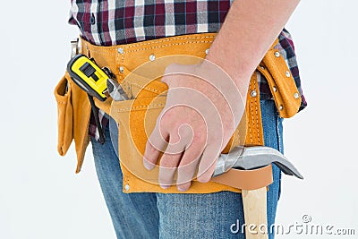 Close-up of male repairman wearing tool belt Stock Photo