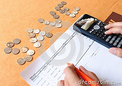 Close up of man with calculator counting making notes at home, c Stock Photo