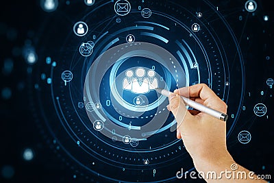 Close up of man hand with pen using glowing people icons hologram. Creative global structure networking and data exchanges Stock Photo