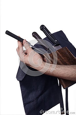Close up, man hands holding set of cooking knives. Stock Photo