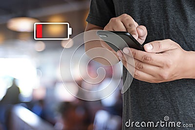 Close up man hands using smart phone battery low charged battery Stock Photo