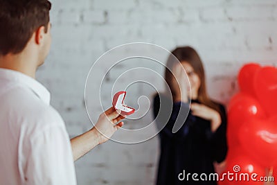 Close up. Man makes proposal of marriage to girl. Love story Stock Photo