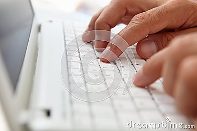 Close up man using computer keyboard Stock Photo