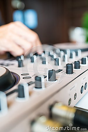 Man using mixing console, audio sound mixer control panel Stock Photo