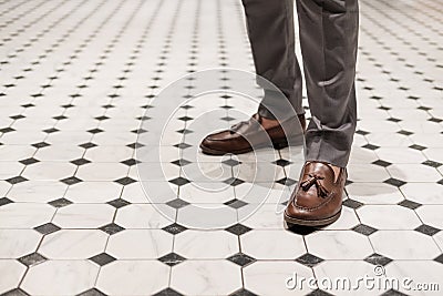 Close-up a man wearing brown leather shoes, classic style Stock Photo