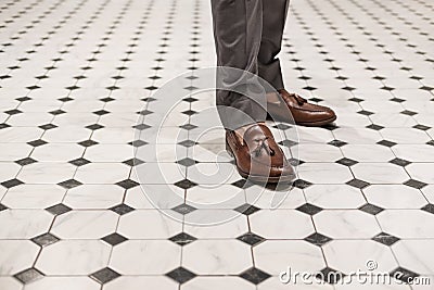 Close-up a man wearing brown leather shoes, classic style Stock Photo
