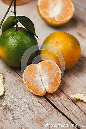 Close up of a mandarin orange over white background. Stock Photo