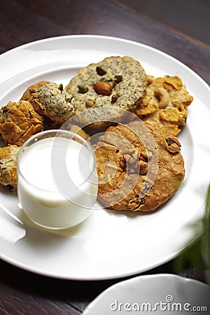 Close up many cookies and milk Stock Photo