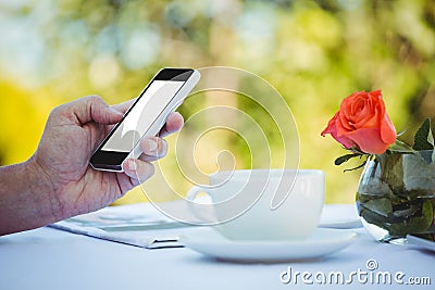 Close up of masculine hands using smartphone Stock Photo