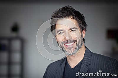 Close Up Of A Mature Man Smiling Stock Photo