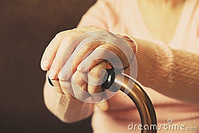 Close up of mature womans hands. Health care giving, nursing home. Parental love of grandmother. Old age related diseases. Stock Photo