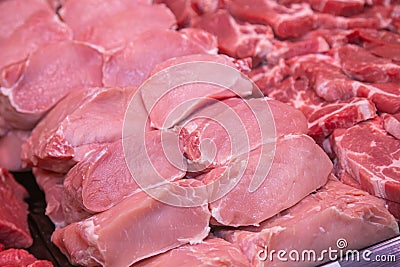 Close up of meat in a supermarket. Raw meat at butcher shop Stock Photo