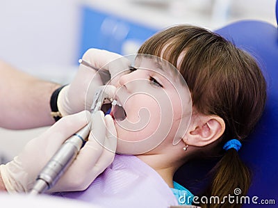 Close-up medical dentist procedure of teeth polish Stock Photo