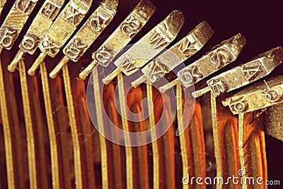 Close up of metal letters on vintage typewriter. Conceptual image of old fashioned office work, communication or writing Stock Photo