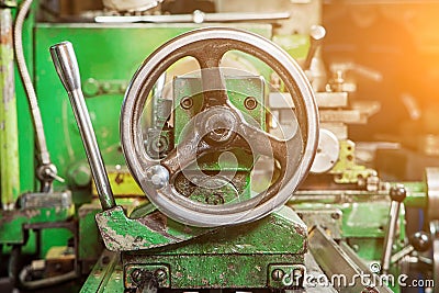 A close-up of a metallic lathe Stock Photo