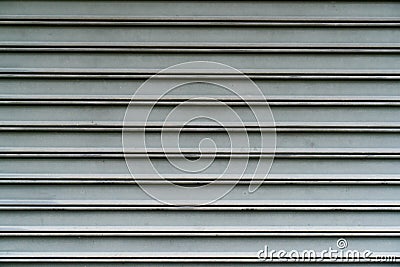 Close up of metallic roll up door surface Stock Photo