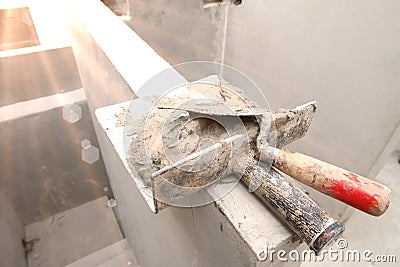 Close-up metallic trowel for plastering Stock Photo