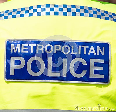 Close up of Metropolitan Police sign on jacket. Editorial Stock Photo