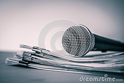 Close up a Microphone with paper document , concept of speaker o Stock Photo