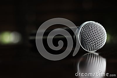 Close up Microphone voice speaker on dark background. radio microphones. wireless sound transmission system. soft focus Two mics C Stock Photo