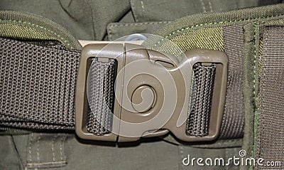 The close up of military green plastic belt buckle Stock Photo