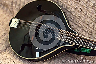 Close up of modeern black musical instrument mandolin Stock Photo