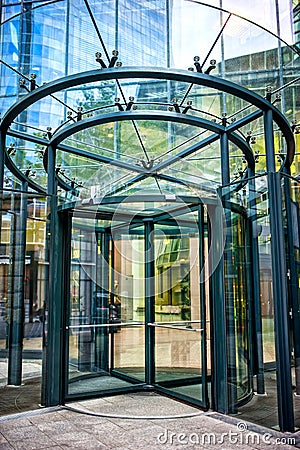 Close-up of modern glass door at corporate business building Stock Photo