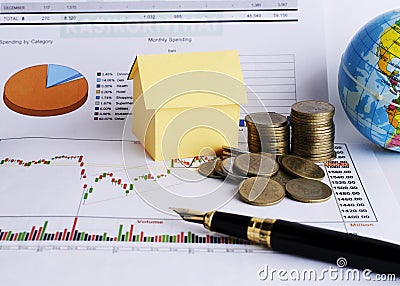 Money coins stack and House paper for Loans money concept Stock Photo