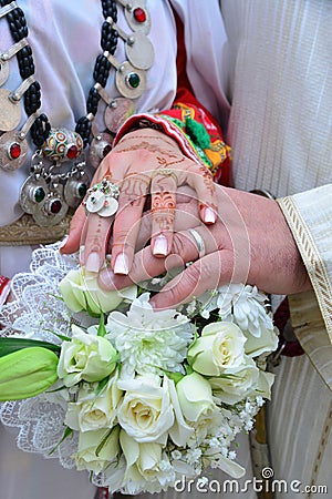 Close up of moroccon couple`s hands at a wedding, Stock Photo