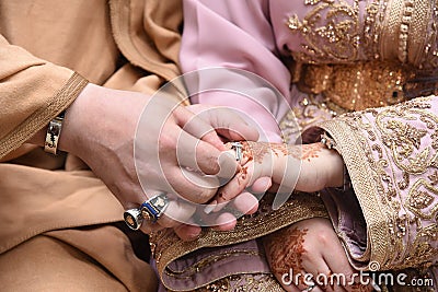 Close up of moroccon couple's hands at a wedding, concept of marriage, Stock Photo