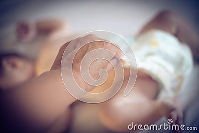 Changing diaper. Stock Photo