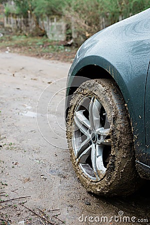 Close-up of a muddy tire on a car Stock Photo