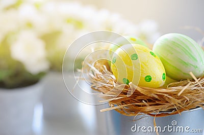 Close up of multicolor Easter eggs in bucket. Stock Photo