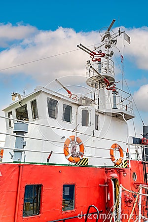 Close up on multiple water cannons and lifebuoys equipped on fireboat or firefighter ship Stock Photo