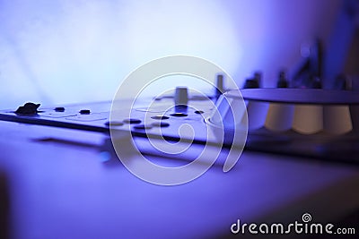 Close up of a music console equipment with blue led light Stock Photo