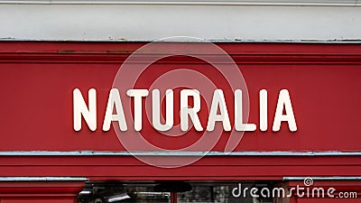 Close-up of a Naturalia sign. Naturalia is a French distribution chain specializing in organic products and fair trade Editorial Stock Photo