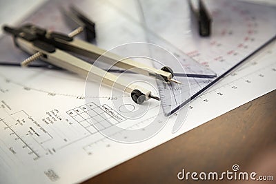 Close up of a navigator's radar plotting chart with a triangle and compass divider Stock Photo