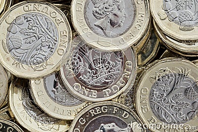 Close up of new British pound coins. Editorial Stock Photo