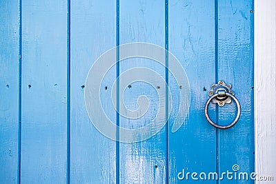 Close-up of a newly painted wooden entrance door, part of a renovated cottage. Stock Photo