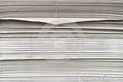 Newspapers folded and stacked background on the table Stock Photo