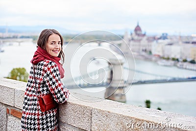 Close-up female looking back at camera against view Hungarian Parliament Stock Photo