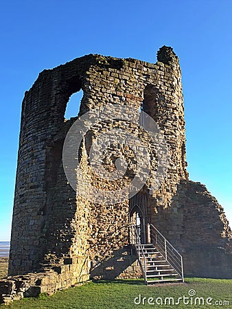 Rmains of old North East stone tower of Flint Castle, Flint, UK. Stock Photo