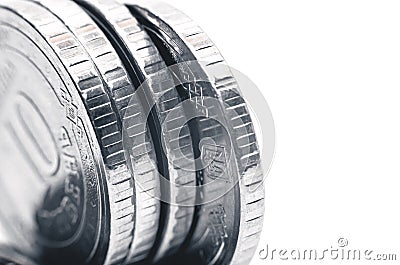 Close-up obverses of silver coins, stacked in uneven stack Stock Photo