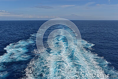 Ocean wake behind cruise ship. Stock Photo