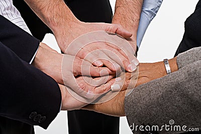 Close up of office workers showing unity Stock Photo