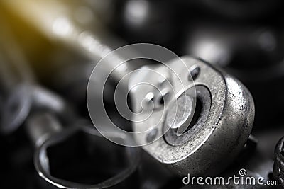 Close up old dirty socket wrench tools for fixing car. Stock Photo