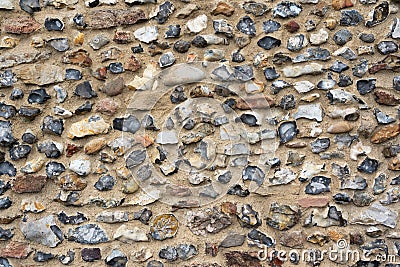 Old English flintstone wall. UK Stock Photo