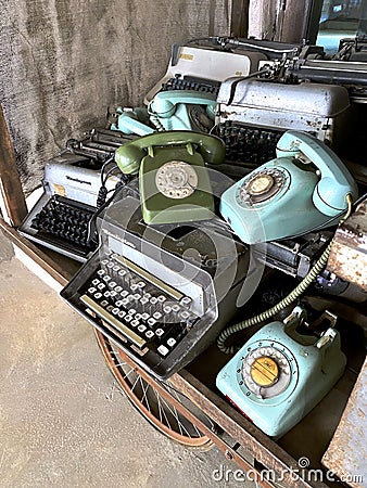 Close-up of old telephones and typewriters Stock Photo